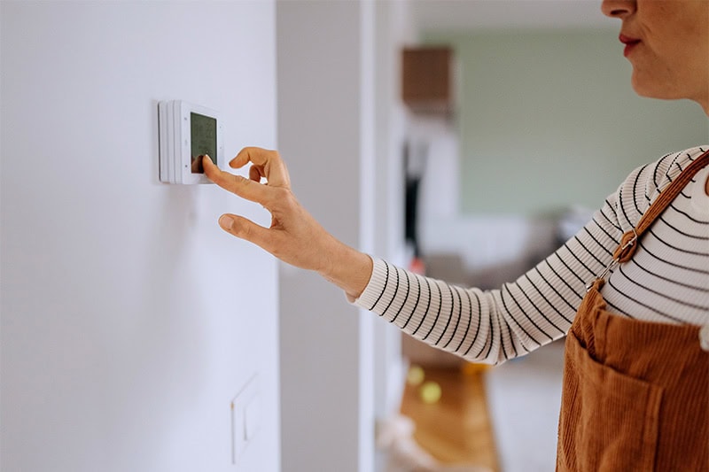 Adjusting a thermostat/